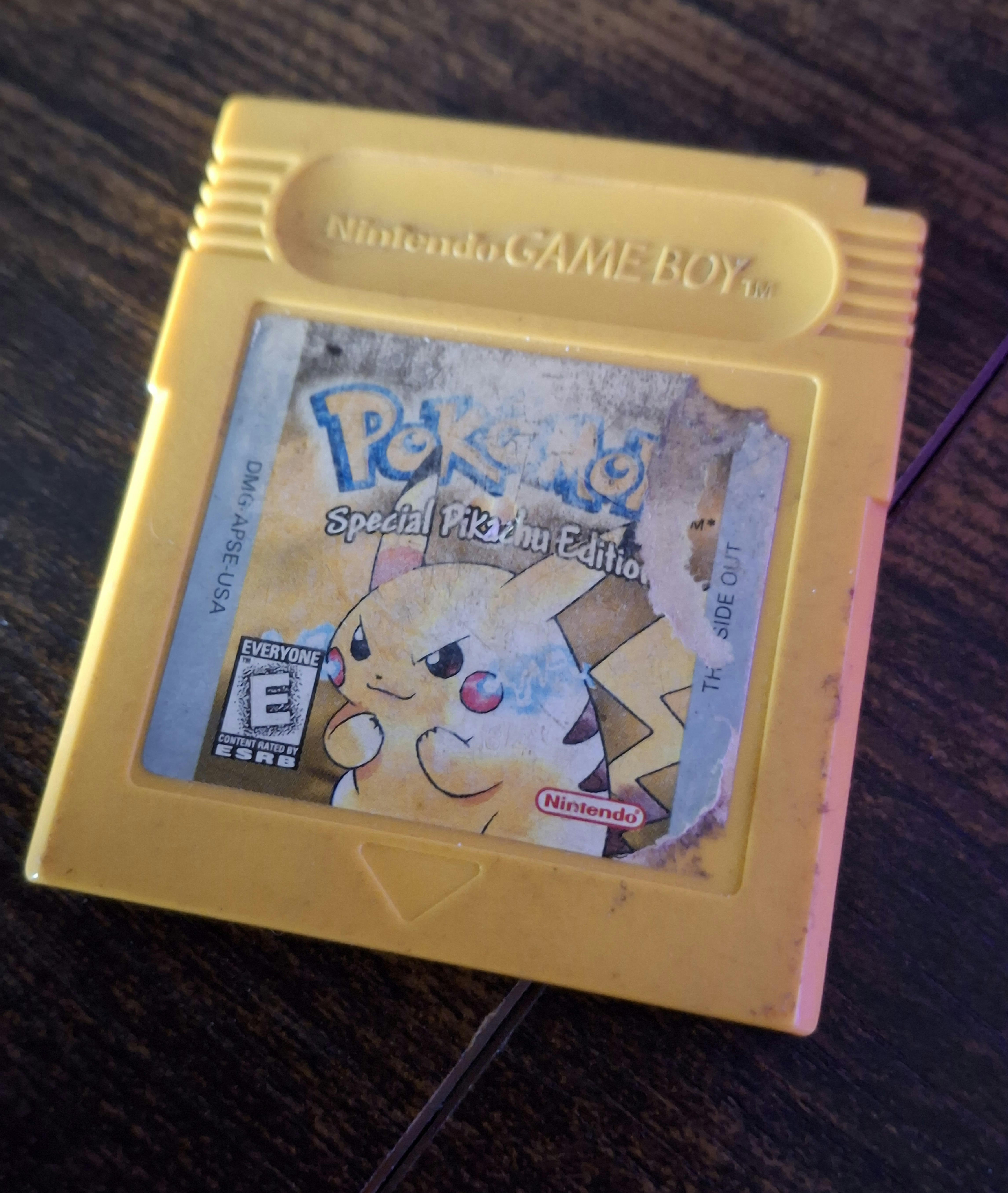 My copy of Pokemon Yellow that is beat to hell.